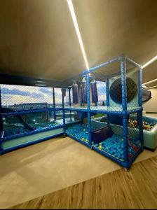 En eller flere senge i et værelse på New Suite 14 Alto Luxo Beira Mar