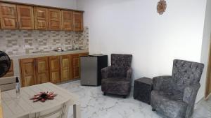 Khu vực ghế ngồi tại apartamentos S & J