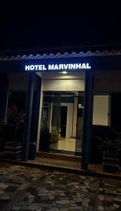 a hotel membrani sign on the front of a building at Hotel MarVinhal in Santa Maria