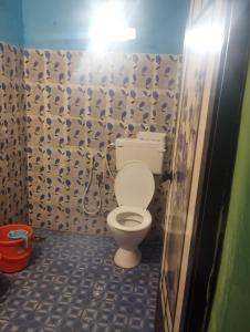 Koupelna v ubytování Ever green home stay + 6 fotografií