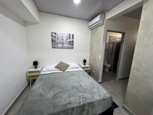 Ένα ή περισσότερα κρεβάτια σε δωμάτιο στο Bosque Mar