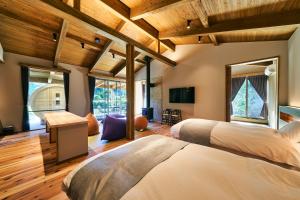 Postel nebo postele na pokoji v ubytování 五氣里-itsukiri- + 31 fotografií