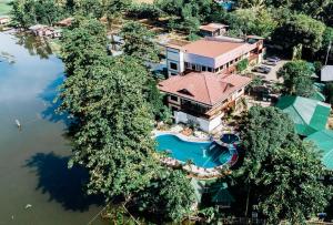 an aerial view of a resort with a pool and trees at Sunrise Garden Lake Resort in Lahit