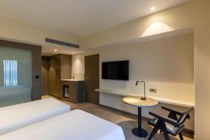 TV a/nebo společenská místnost v ubytování Radisson Hotel Phagwara