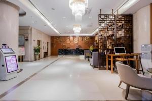 TV a/nebo společenská místnost v ubytování Yitel Shanghai Hongqiao Railway Station National Convention and Exhibition Center