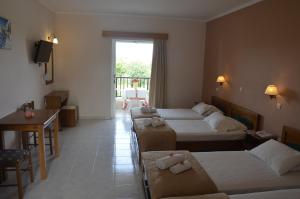 Postel nebo postele na pokoji v ubytování Jenny Hotel + 37 fotografií