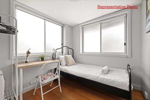 Ένα ή περισσότερα κρεβάτια σε δωμάτιο στο Light & Simple Single Room - Peakhurst Area - Shared Bathroom