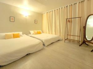 Postel nebo postele na pokoji v ubytování BADA Stay