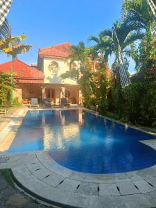 Πισίνα στο ή κοντά στο Ada Waktu Homestay