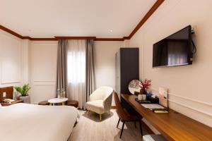 TV a/nebo společenská místnost v ubytování Ancient Luxury Hotel