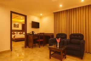 Μια τηλεόραση ή/και κέντρο ψυχαγωγίας στο The Grand - A Premium Hotel near ISBT SIMLA