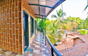 Κήπος έξω από το New Aarya Homestay Tarkarli