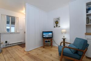 TV a/nebo společenská místnost v ubytování 6 Village Edge condo