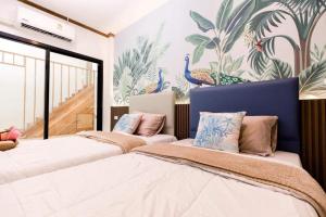 Ένα ή περισσότερα κρεβάτια σε δωμάτιο στο Sichon Pool Villa +206 φωτογραφίες