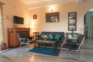 Μια τηλεόραση ή/και κέντρο ψυχαγωγίας στο Rooftop Cityscape Inn