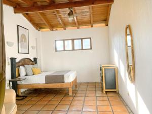 Postel nebo postele na pokoji v ubytování Casa Hidalgo Hideaway