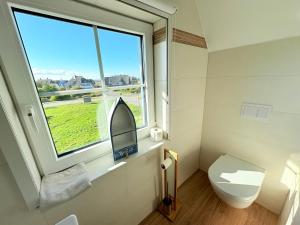 Koupelna v ubytování Ferienhaus Heimathafen Dranske + 18 fotografií