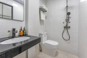 Phòng tắm tại shenzhen kaixin Hotel