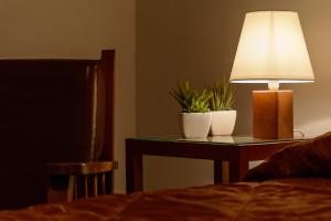 Säng eller sängar i ett rum på Hotel Oiti