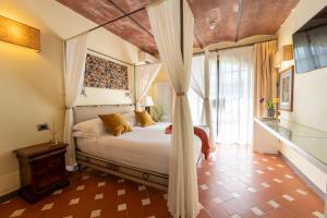 Ένα ή περισσότερα κρεβάτια σε δωμάτιο στο Borgo San Luigi +77 φωτογραφίες