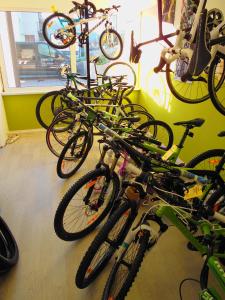 a group of bikes parked in a room at Apartma R Sport in Tolmin +3 photos