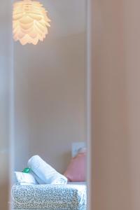 En eller flere senge i et værelse på Maison 3 chambres, espace et jolie vue