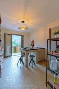 Køkken eller tekøkken på Maison 3 chambres, espace et jolie vue