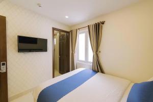 Μια τηλεόραση ή/και κέντρο ψυχαγωγίας στο Thanh Downtown Hotel - Bước Chân Là Đến Chợ Đêm