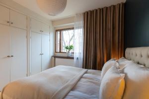 Ένα ή περισσότερα κρεβάτια σε δωμάτιο στο Tilava saunallinen kolmio