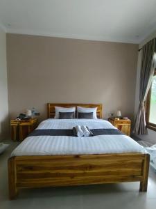 Ένα ή περισσότερα κρεβάτια σε δωμάτιο στο Greenfield-Lombok