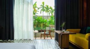 Postel nebo postele na pokoji v ubytování K.K inn Boutique Siem Reap