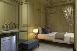 Ліжко або ліжка в номері Gấu Hotel Cầu Giấy