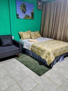 Postel nebo postele na pokoji v ubytování La Fortuna Brisas del Recuerdo