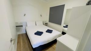 Voodi või voodid majutusasutuse Griffith Tourist Caravan park toas