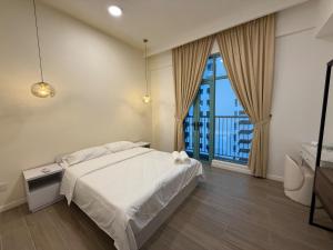 Ένα ή περισσότερα κρεβάτια σε δωμάτιο στο Bay Suite at Kota Kinabalu - 8Avenue +47 φωτογραφίες