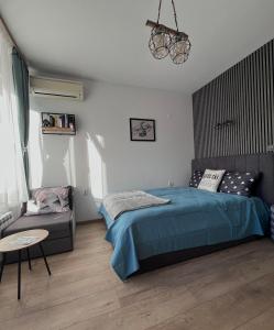 En eller flere senge i et værelse på Mountain View Studio Borovets Hills A60