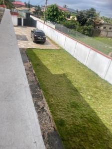 Κήπος έξω από το Enyo Home