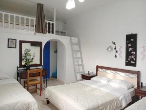 Ένα ή περισσότερα κρεβάτια σε δωμάτιο στο The Best  +107 φωτογραφίες