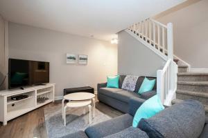 Et tv og/eller underholdning på Tranquility Oasis Ski-In Out Hot Tub Shuttle