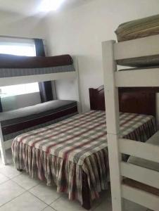 Ένα ή περισσότερα κρεβάτια σε δωμάτιο στο Casa em São Luís-Ma