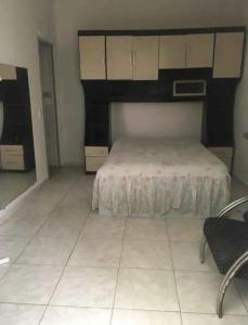 Ένα ή περισσότερα κρεβάτια σε δωμάτιο στο Casa em São Luís-Ma +3 φωτογραφίες