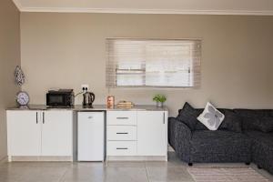 Kuchyň nebo kuchyňský kout v ubytování Pecan Heights Studios