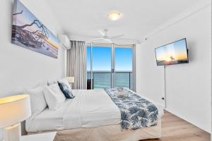 Ένα ή περισσότερα κρεβάτια σε δωμάτιο στο Stunning Beach & Ocean Views +44 φωτογραφίες