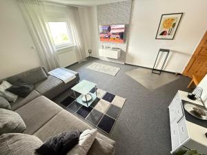 Μια τηλεόραση ή/και κέντρο ψυχαγωγίας στο Ferienwohnung HAWELA