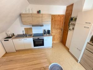 Η κουζίνα ή μικρή κουζίνα στο Ferienwohnung HAWELA +15 φωτογραφίες