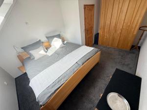 Ένα ή περισσότερα κρεβάτια σε δωμάτιο στο Ferienwohnung HAWELA