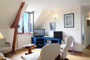 TV/trung tâm giải trí tại Les Chouettes