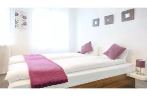 Postel nebo postele na pokoji v ubytování White Villa + 19 fotografií