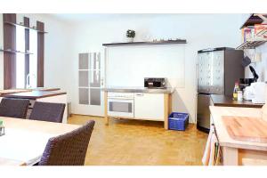 Kuchyň nebo kuchyňský kout v ubytování White Villa