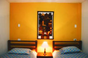 Postel nebo postele na pokoji v ubytování Hostal Timara + 5 fotografií